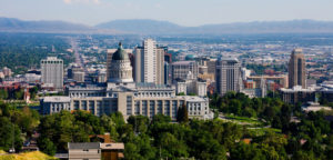 Landscape shot of Salt Lake City, Utah with urban building and mountains in the background